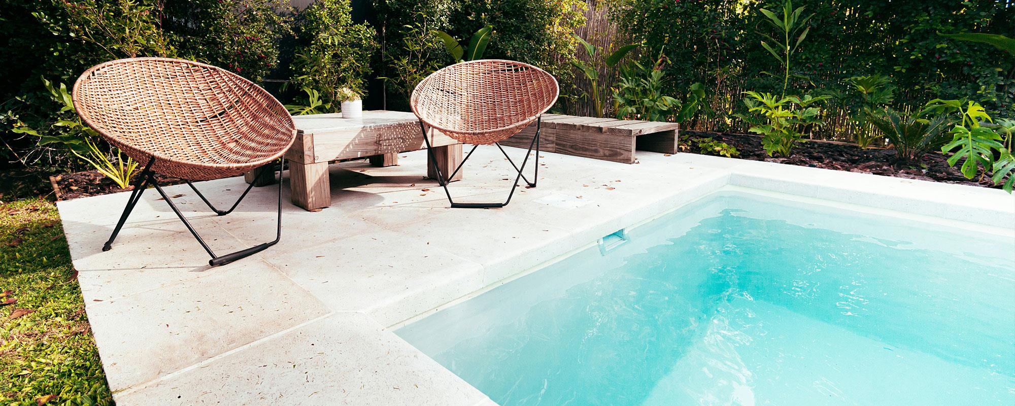 pool with two chairs